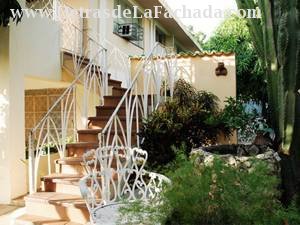 Entrance with staircase and well