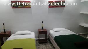 Room with two single beds