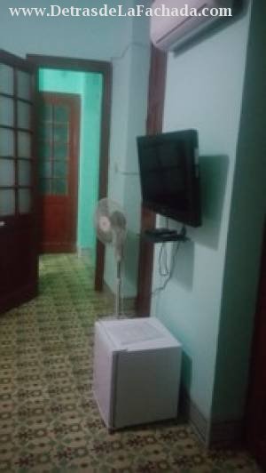 Room with Split, minibar, TV and fan