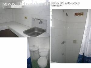 Part of the kitchen and bathroom