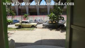 View of outside where cars Park