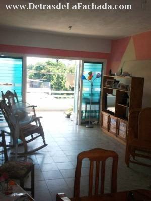 Sala comedor y balcón