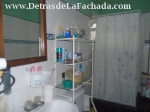 Spacious bathroom with enclosed shower