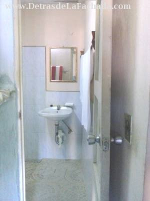 Entrance to the bathroom of the House below