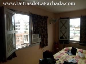 Calle A No 12 altos  entre libertad y maceo.Holguin