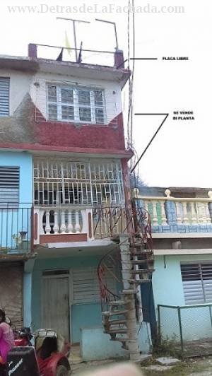 Calle A No 12 altos  entre libertad y maceo.Holguin