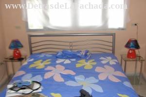 Calle A No 12 altos  entre libertad y maceo.Holguin