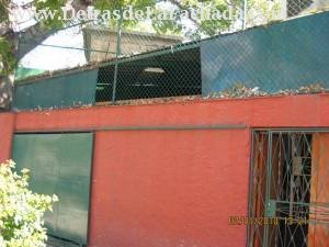 Entrada trasera dela casa y garage