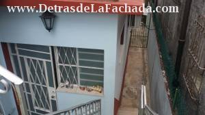 Side aisle with access to apartments