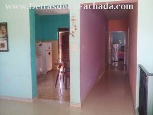 View of part of the room, hall and kitchen