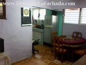 Dining room and kitchen in the background