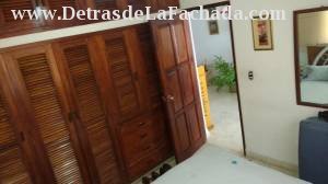 Rooms 2nd floor closet of wood, and drawers