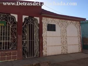 FRENTE CON EL GARAJE