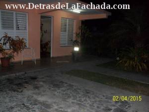 Facade of the House, garage and garden space