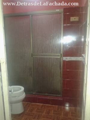 Bath main sink behind the door