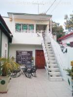 Main entrance with garage