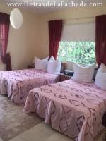 Spacious room with two double beds and space